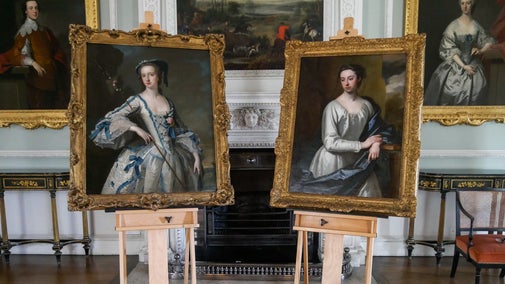 Portraits of Elizabeth Yorke-Anson and Margaret Cocks-Yorke side by side in Wimpole Hall's Long Gallery